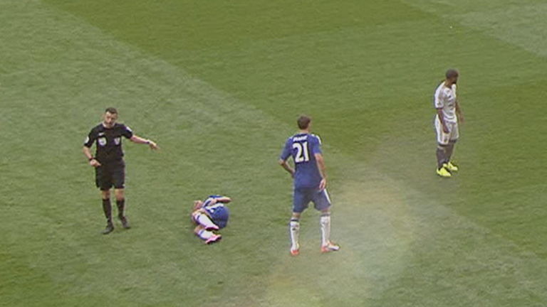 Michael Oliver and Eden Hazard