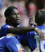 Didier Drogba celebrates one of his two goals.
