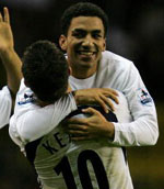 Aaron Lennon celebrates the winner against Chelsea