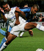 Ashley Cole and Jermaine Easter in action