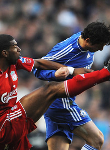 Belletti and Babel battle for the ball