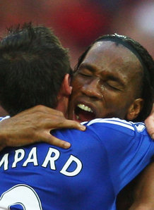 Frank Lampard and Didier Drogba celebrate Didier's goal