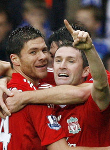 Xabi Alonso celebrates his goal against Chelsea