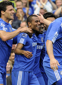 Ashley Cole celebrates his goal