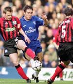 Frank Lampard fights for the ball
