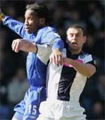 Drogba goes for the ball