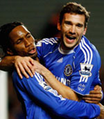 Didier Drogba and Andrei Shevchenko celebrate a goal