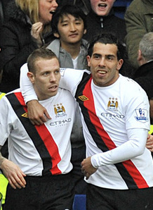 Craig Bellamy and Carlo Tevez