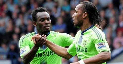 Michael Essien congratulates Didier Drogba
