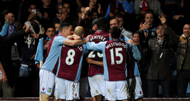 Villa celebrate Fabian Delph's goal