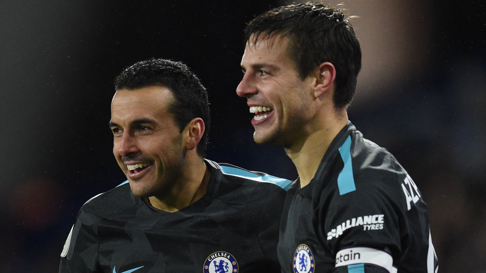 Pedro and Cesar Azpilicueta celebrate Pedro's goal