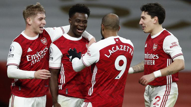 Arsenal celebrate their third goal